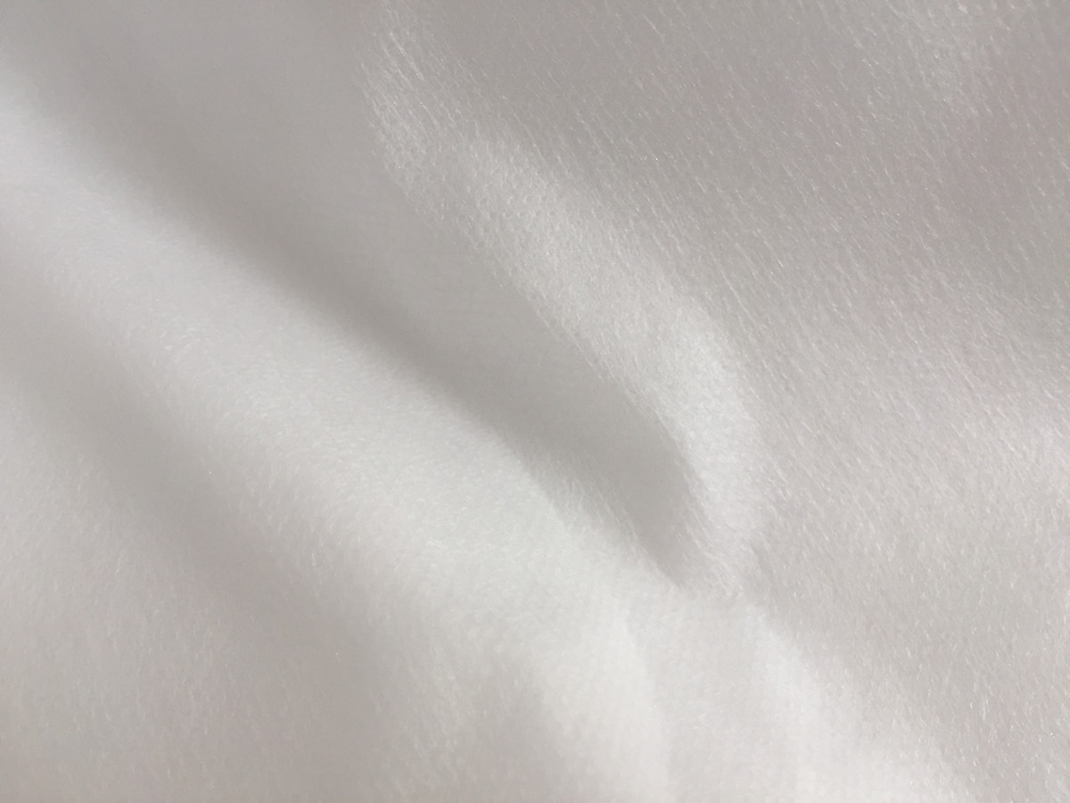 Thermally bonded nonwoven Fabric Thermobonded nonwoven